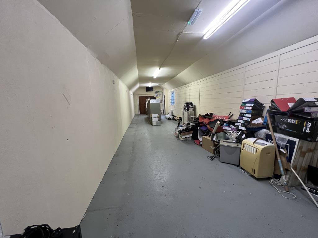 Lot: 130 - COMMERCIAL BUILDING WITH PLANNING FOR TWO FLATS TO THE UPPER FLOORS AND FURTHER POTENTIAL - General view of the filing room
